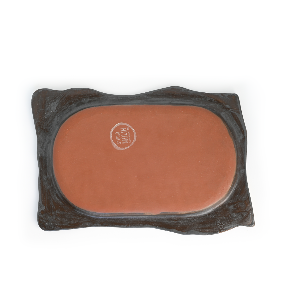 Bottom view of the Chiseled Serving Platter showing the Studio Molin maker’s stamp