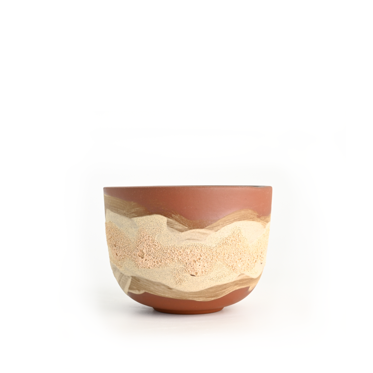 Side profile of the Coupe Bowl withut a lid showing its compact form and layered glaze finish