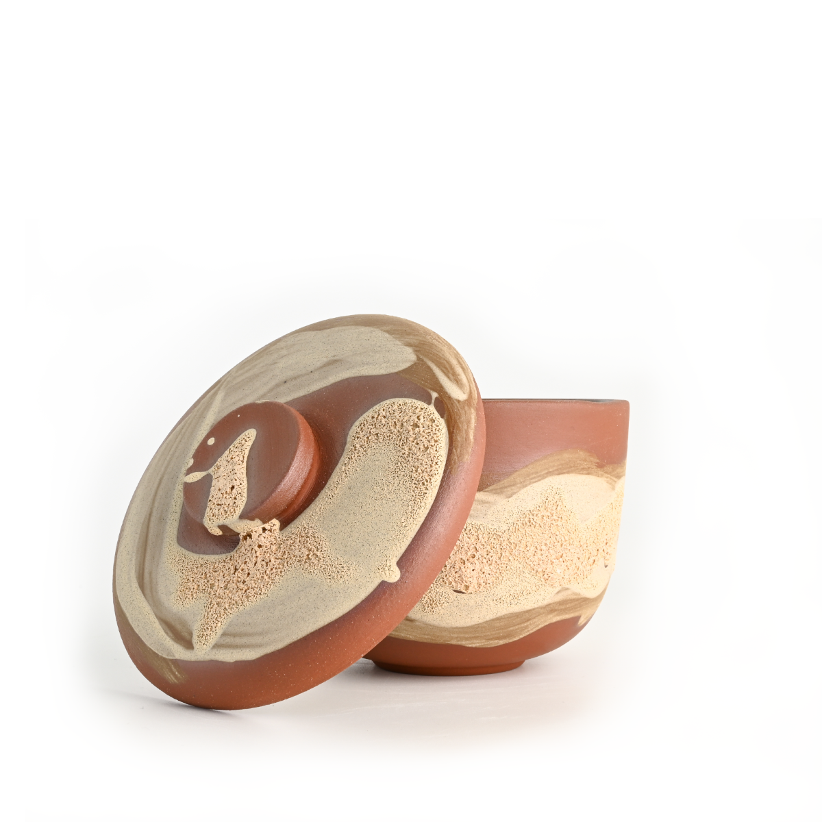 Side profile of the Coupe Bowl and Lid Set showing its compact form and layered glaze finish