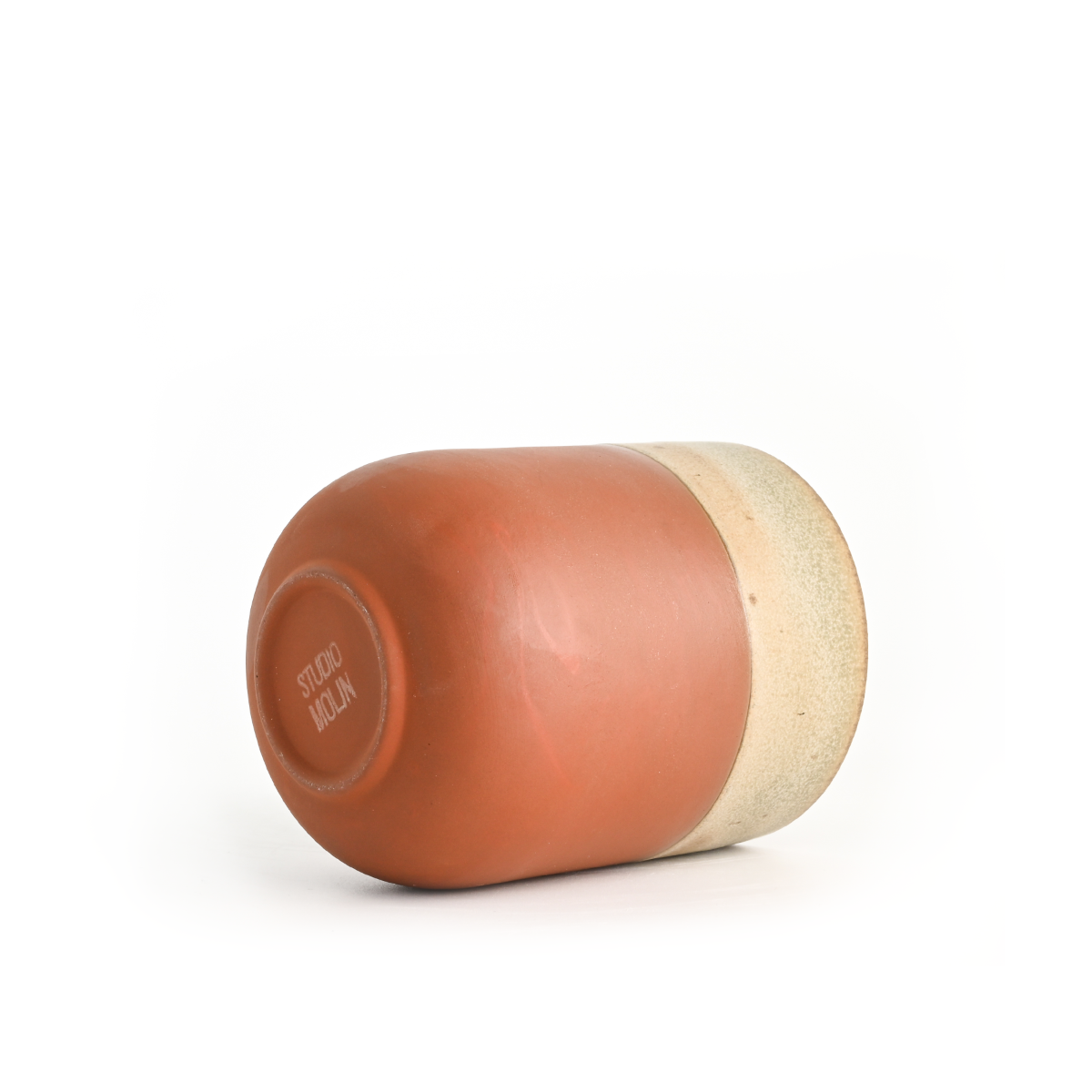 Bottom view of the Coupe Mug in sage showing the Studio Molin maker’s stamp