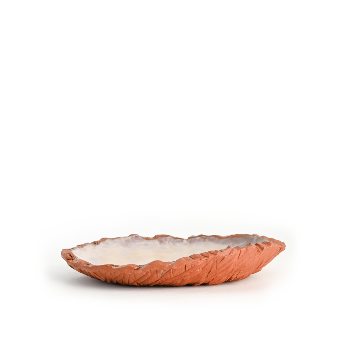 Handcrafted Marked Plate by Studio Molin featuring a textured surface and matte apricot cream glaze